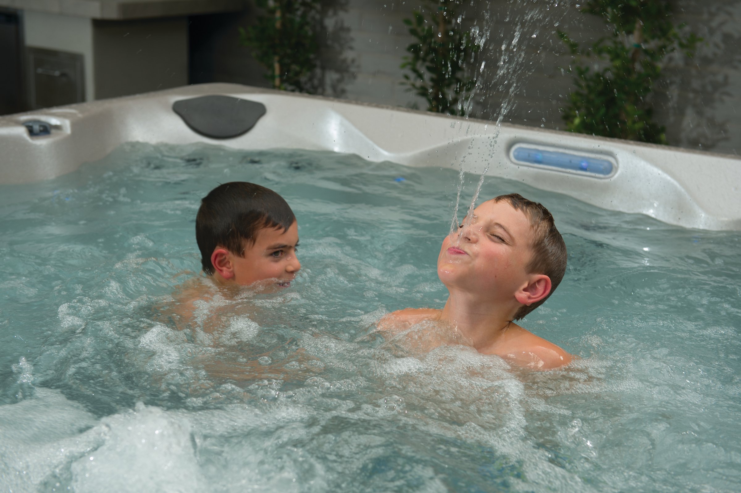 Boy Spraying Water